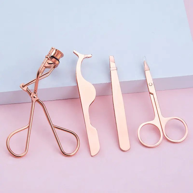 4-Pcs Eyelash Curler Kit w/ Satin Bag, Eyelash Curler, Eyelash Applicator, Eyebrow Tweezers & Eyebrow Scissor